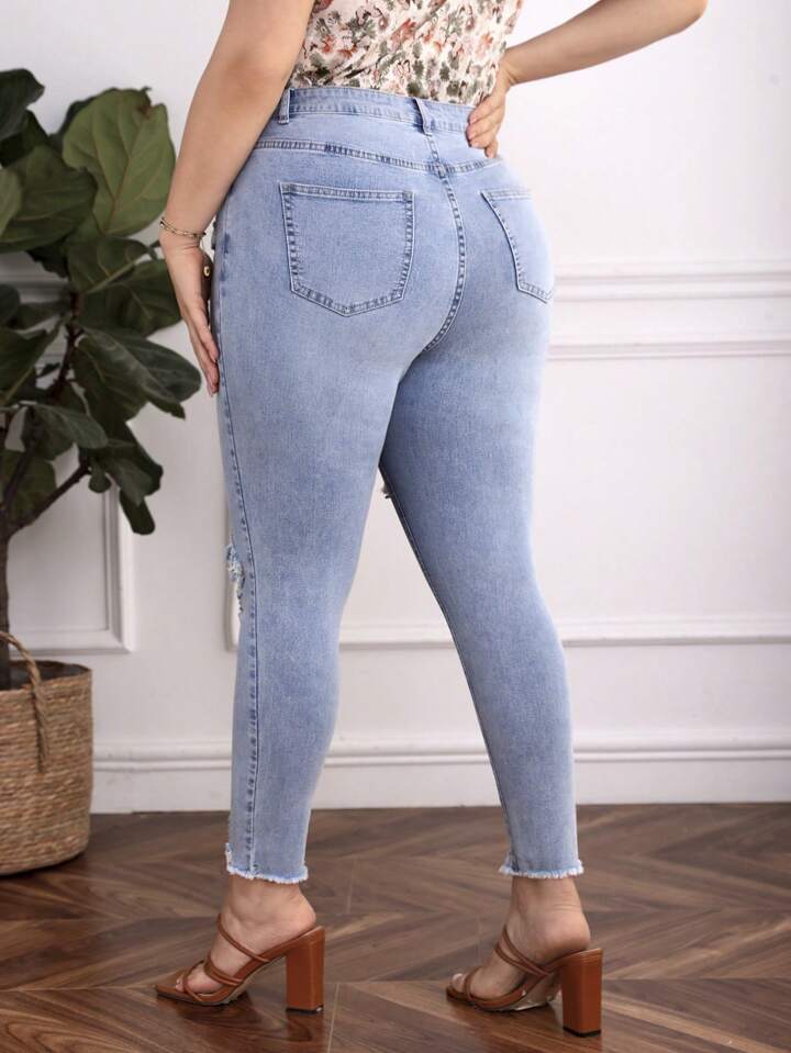 SHEIN Plus Ripped Raw Cut Skinny Jeans