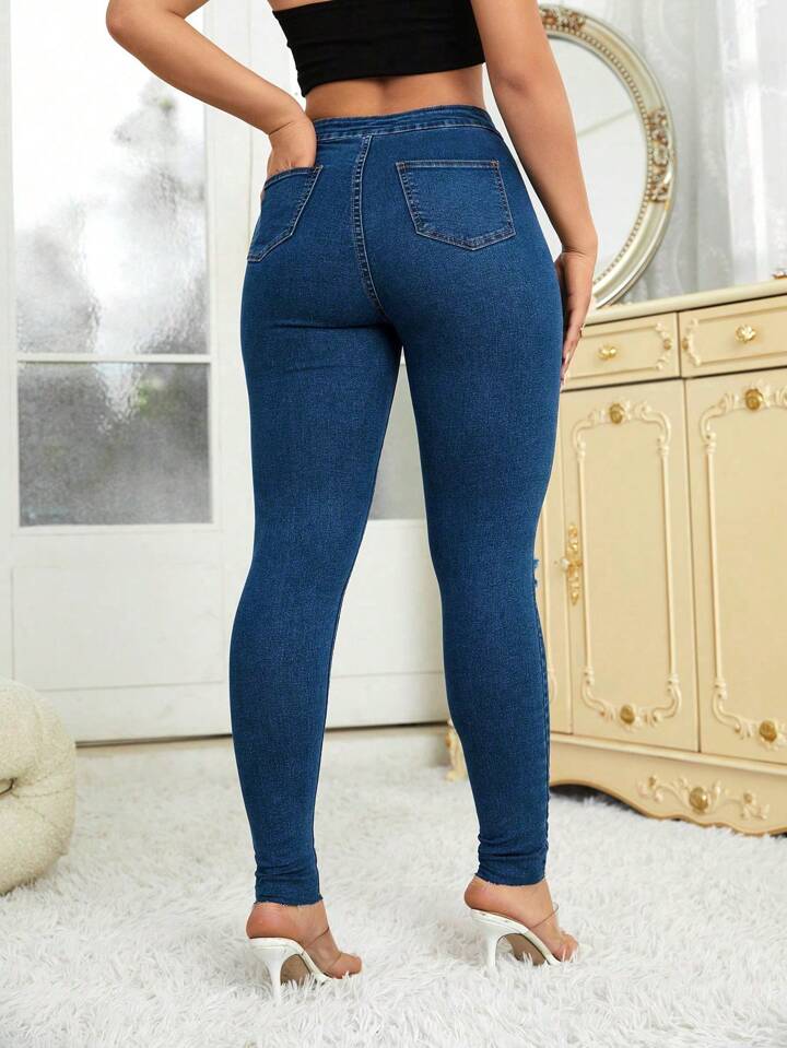 SHEIN Essnce Ripped Raw Hem Skinny Jeans